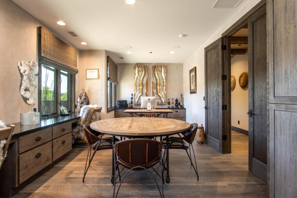 The study from the doorway, meeting table in the middle