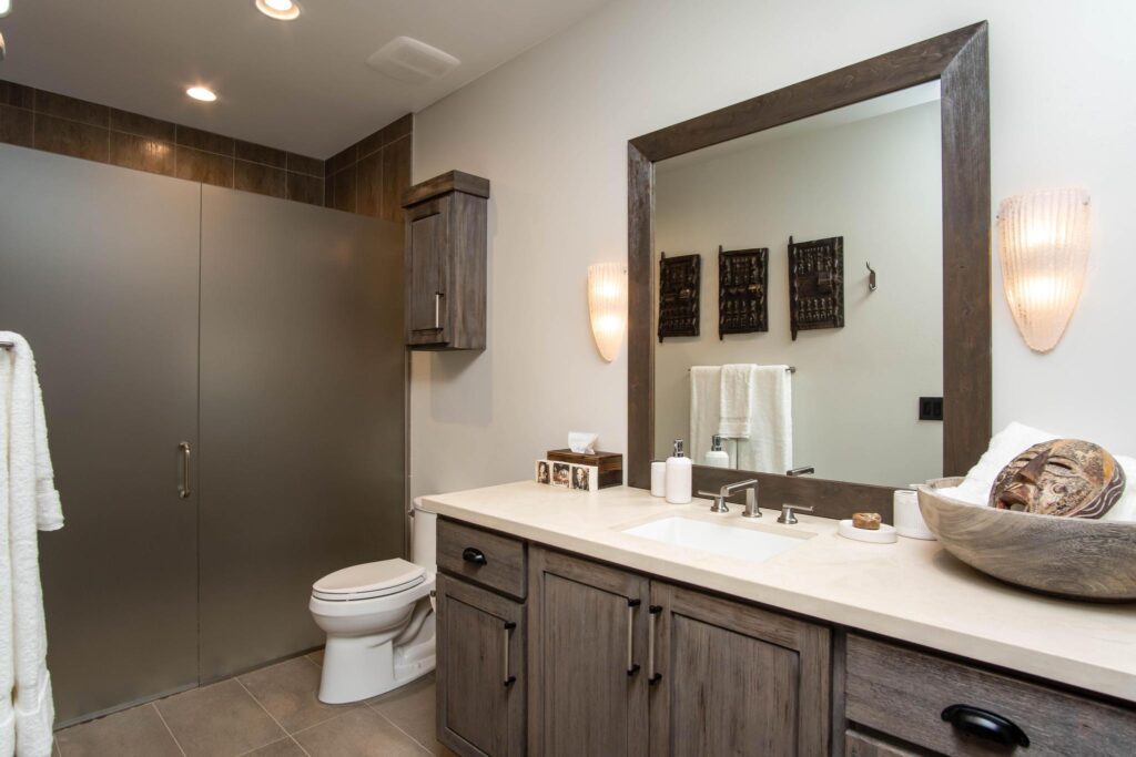 The same bathroom from the vanity, mirror framed in timber