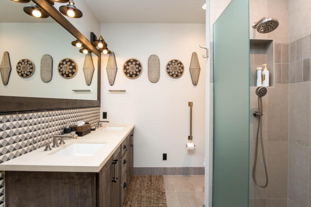 The same bathroom looking through to the shower
