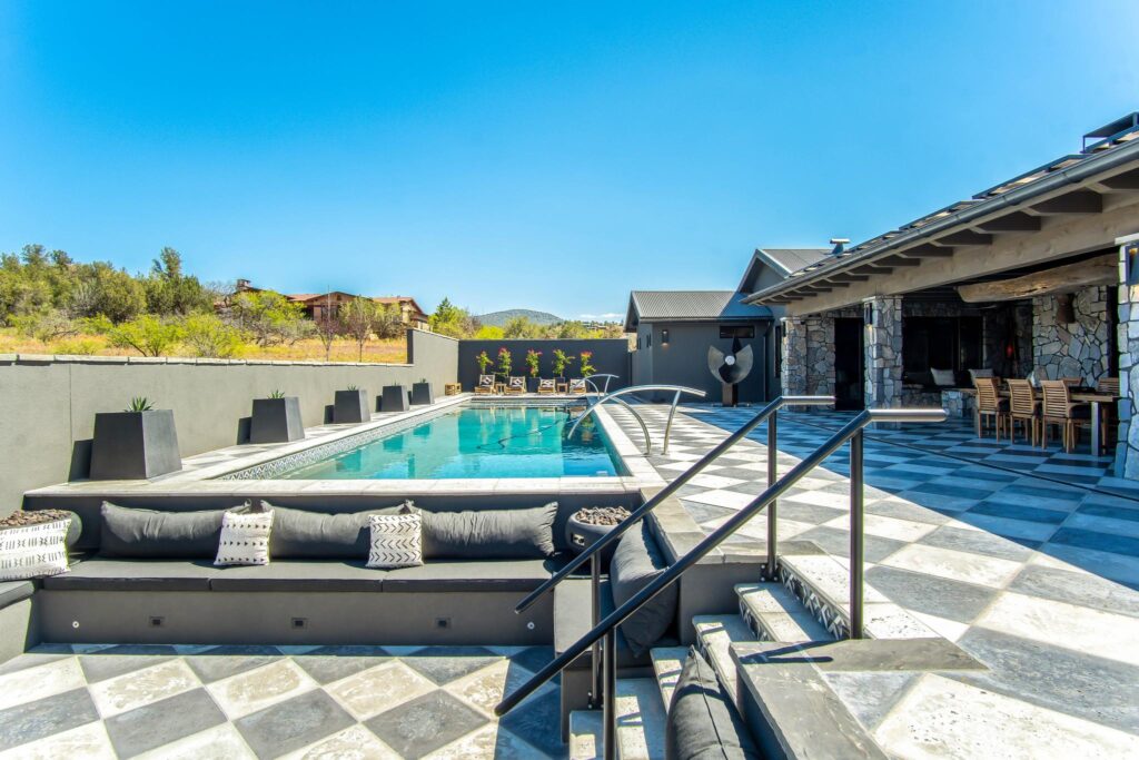 The pool from the shallow end, running the length of the terrace