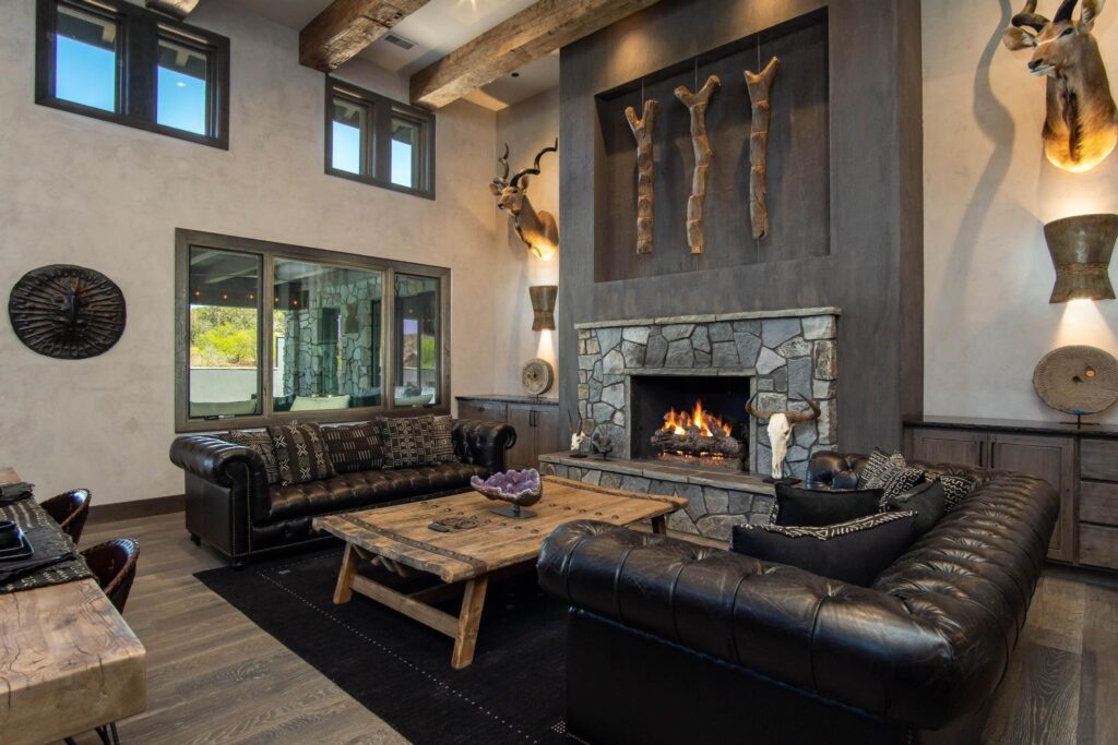 The living room from the side, clerestory windows above the fireplace