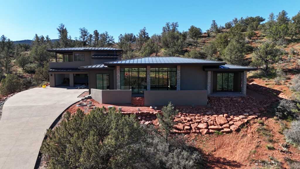 Star Ranch seen from above, stepping down the hillside on its stone base