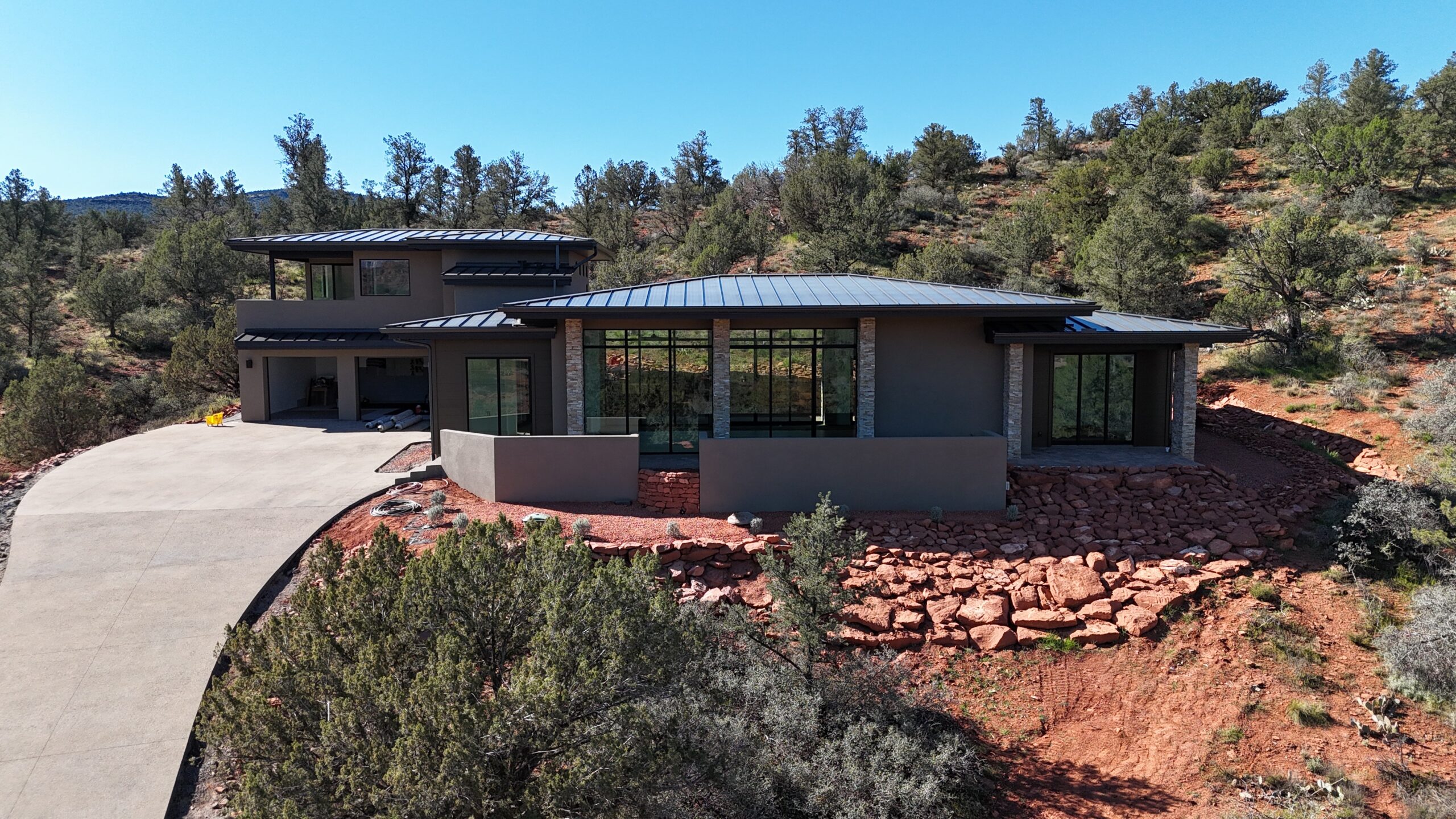Star Ranch seen from above, stepping down the hillside on its stone base