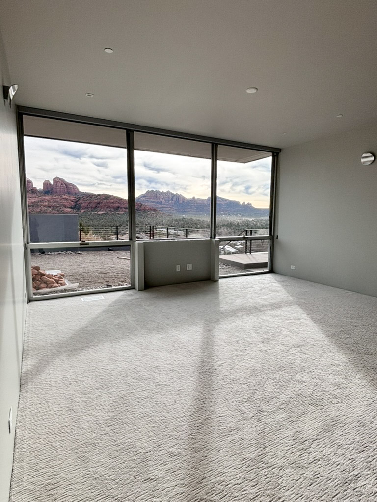 Room glazed on two sides with a slider onto the terrace
